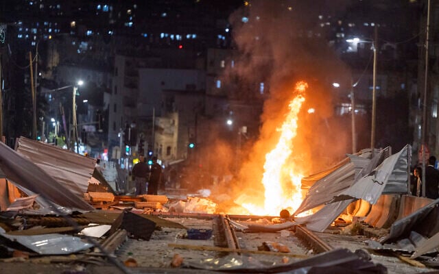 Ultra-Orthodox Jewish protesters set fire to construction materials during a protest against work on the Jerusalem Light Rail in the Bar-Ilan area of Jerusalem, June 8, 2026 (Chaim Goldberg/Flash90) Ultra-Orthodox Jewish protesters set fire to construction materials during a protest against work on the Jerusalem Light Rail in the Bar-Ilan area of Jerusalem, June 8, 2026 (Chaim Goldberg/Flash90)