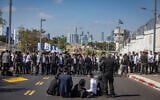 Ultra-Orthodox protesters outside the Abu Kabir detention facility in Tel Aviv, June 10, 2026. (Chaim Goldberg/Flash90)