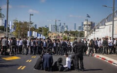 Ultra-Orthodox protesters outside the Abu Kabir detention facility in Tel Aviv, June 10, 2026. (Chaim Goldberg/Flash90)