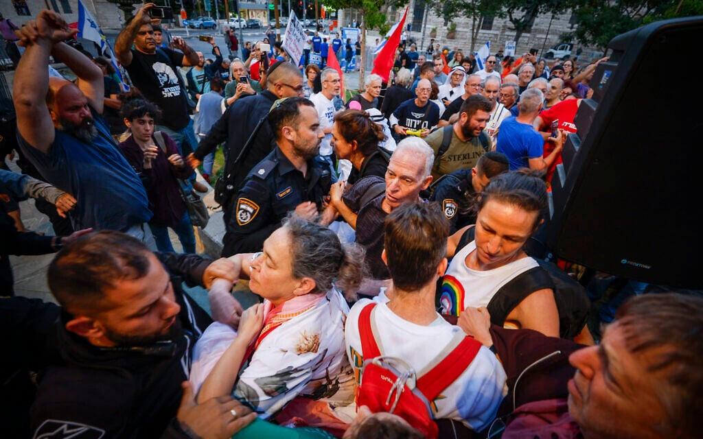 Demonstrators clash with police during an antigovernment protest in Jerusalem, June 13, 2026. (Jamal Awad/Flash90)