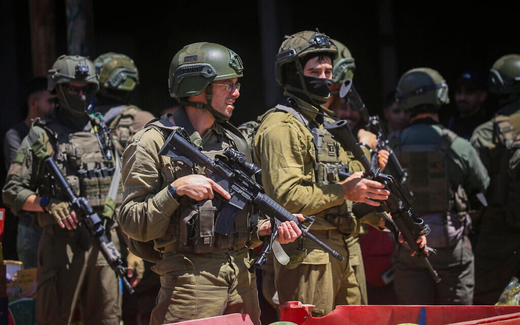 Israeli security forces operate during a raid in the West Bank city of Nablus, June 14, 2026. (Nasser Ishtayeh/Flash90)