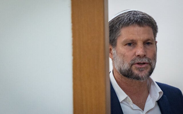 Finance Minister Bezalel Smotrich arrives for a REligious Zionism faction meeting at the Knesset in Jerusalem, June 15, 2026. (Yonatan Sindel/Flash90)