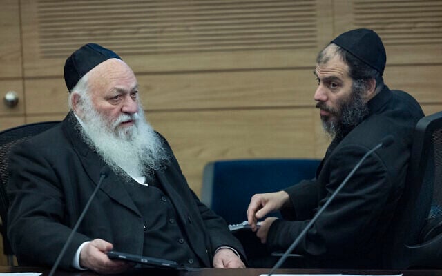 United Torah Judaism chair Yitzhak Goldknopf and his senior adviser Motti Babchik attend a Knesset House committee meeting on June 16, 2026.(Yonatan Sindel/Flash90)