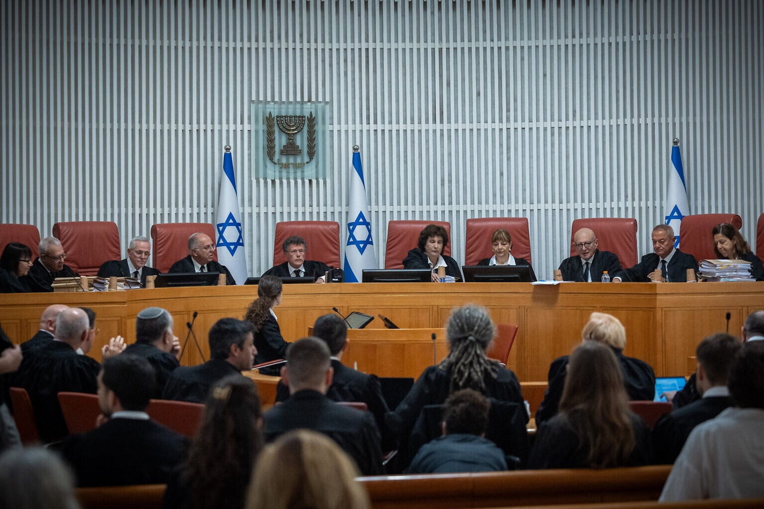 Supreme Court President Isaac Amit and 10 justices at a High Court hearing on a law increasing political power over judicial appointments in Jerusalem, June 21, 2026. (Yonatan Sindel/Flash90)