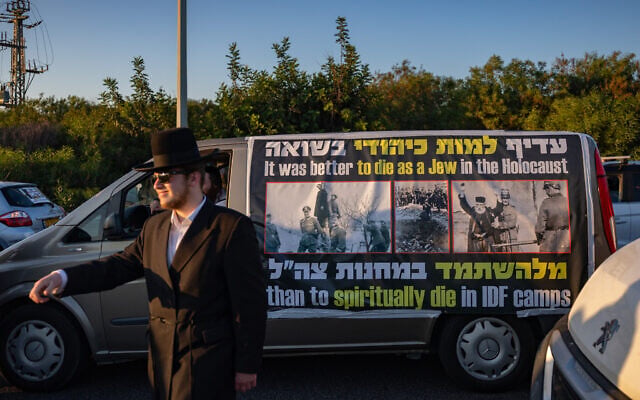 Ultra-Orthodox Jewish men block Route 1 near Jerusalem during a protest against the imprisonment of Haredi draft evaders, June 24, 2026. (Yonatan Sindel/Flash90) Ultra-Orthodox Jewish men block Route 1 near Jerusalem during a protest against the imprisonment of Haredi draft evaders, June 24, 2026. (Yonatan Sindel/Flash90)
