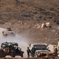 Israeli military vehicles and personnel seen at a border crossing into Lebanon, June 28, 2026. (Ayal Margolin/FLASH90)