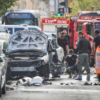 Police and rescue forces at the scene where a car exploded in a suspected gangland killing, in Jaffa, June 28, 2026. (Avshalom Sassoni/Flash90)