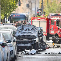 Police and rescue forces at the scene where a car exploded in a suspected gangland killiing, in Jaffa, June 28, 2026. (Avshalom Sassoni/Flash90)