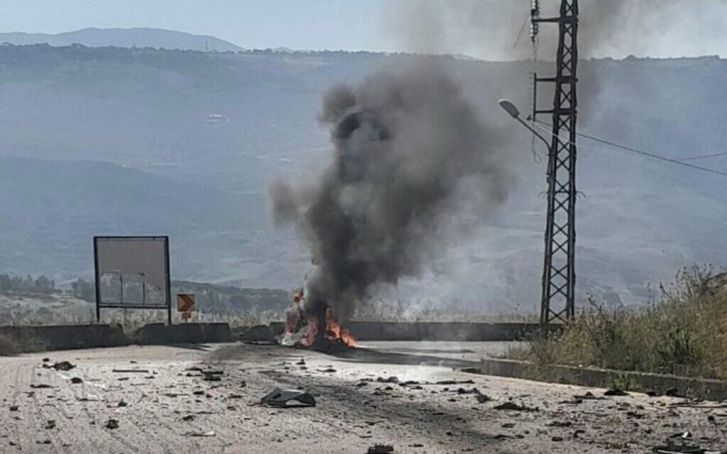 A photo published by the Lebanese Armed Forces shows smoke rising from the wreckage of a military vehicle targeted in an Israeli strike that killed a brigadier general, a captain and a third soldier, on a road between Kfar Tebnit and Khardali in south Lebanon on June 6, 2026. (Lebanese Armed Forces via X)
