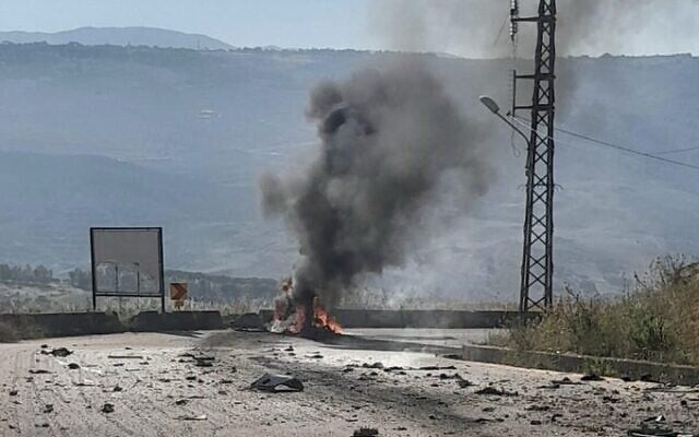 A photo published by the Lebanese Armed Forces shows smoke rising from the wreckage of a military vehicle targeted in an Israeli strike that killed a brigadier general, a captain and a third soldier, on a road between Kfar Tebnit and Khardali in south Lebanon on June 6, 2026. (Lebanese Armed Forces via X)