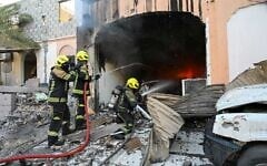 Firefighters work to extinguish a fire caused by a debris from intercepted Iranian drones in Manama, Bahrain, June 11, 2026. (Bahrain Interior Ministry)