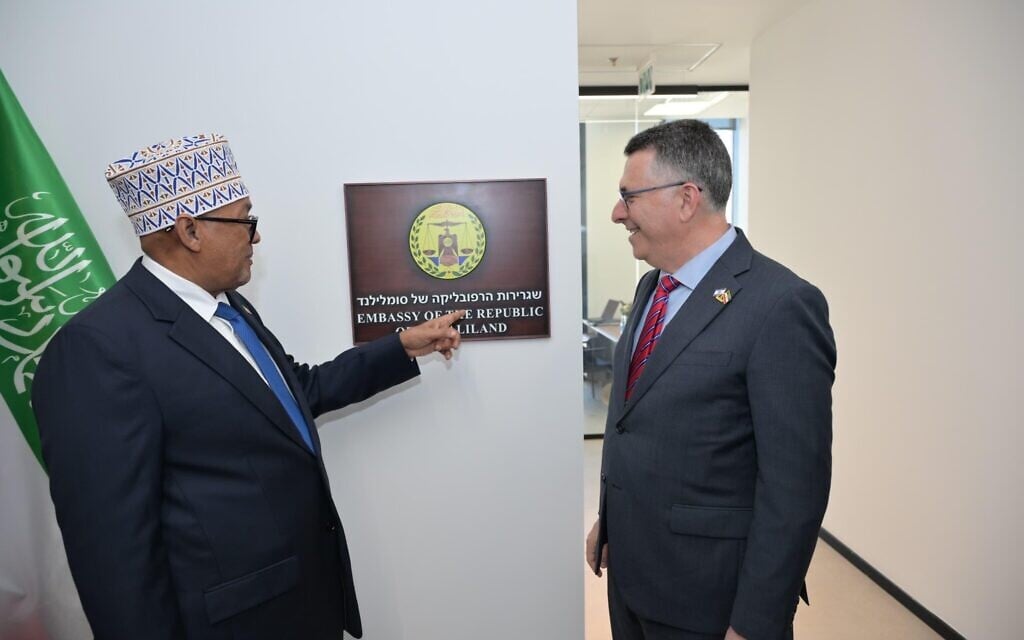 Somaliland President Abdirahman Mohamed Abdullahi, left, and Israeli Foreign Minister Gideon Sa'ar open Somaliland's embassy in Jerusalem, June 15, 2026. (Shlomi Amsalem/GPO)