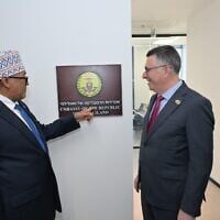 Somaliland President Abdirahman Mohamed Abdullahi, left, and Israeli Foreign Minister Gideon Sa'ar open Somaliland's embassy in Jerusalem, June 15, 2026. (Shlomi Amsalem/GPO)