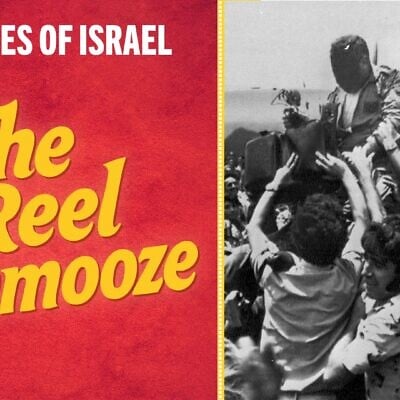A cheering crowd at Tel Aviv's Ben-Gurion Airport raises a member of the rescue squad that freed the hijacked hostages from Uganda earlier in the day, July 4, 1976. In the background is the C-130 transport plane that took part in the raid. The rescuer's face is obscured for security reasons. (AP Photo/Pool)