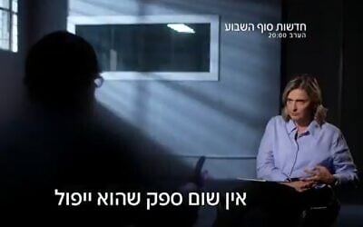 Former senior Mossad official, Aleph, with back to camera, speaks to Dana Weiss of Channel 12 news, in an interview June 6, 2026. (Channel 12 screenshot)