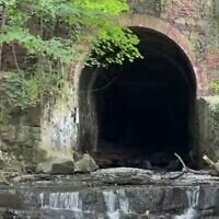 A drainage tunnel in Nyack Memorial Park, New York from where dozens of Jewish girls on a school field trip entered the city's sewer system on June 10, 2026. (Screenshot/CBS New York)