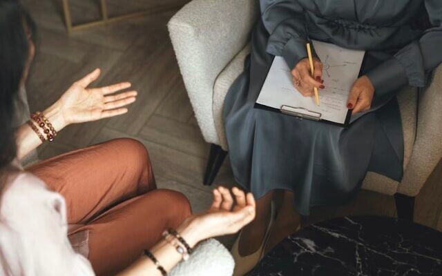 Illustrative: A patient and psychologist (Stock photo/Fiordaliso via JTA) Illustrative: A patient and psychologist (Stock photo/Fiordaliso via JTA)