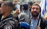 Religious Zionism MK Zvi Sukkot speaks to reporters during an uncoordinated visit to schools in Umm al-Fahm, sparking protest from residents on June 28, 2026. (Screenshot/X)