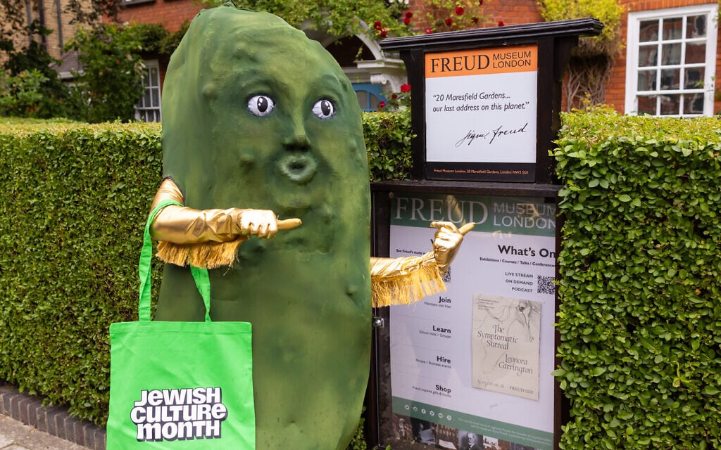 Jewish Culture Month mascot Mr. Pickle poses outside the launch party in London, May 2026. (Sophie Shaw)