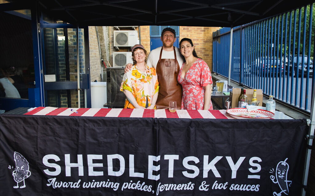 Representatives of Shedletsky's Deli at a stall during Jewish Culture Month in London, June 2026. (Sophie Shaw)