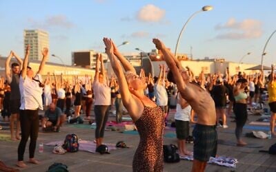 Hundreds of yoga enthusiasts at the Tel Aviv Port on June 21, 2026, for the International Day of Yoga (Harold Silberg/ Indian embassy)