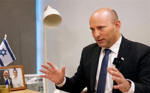 Together party leader and former prime minister Naftali Bennett in an interview for The Times of Israel at his Together party HQ on June 11, 2026 (Yitzhak Ledee/Times of Israel)