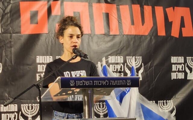 Merav Svirsky, sister of slain hostage Itay Svirsky, speaks at the anti-government rally at Habima Square in Tel Aviv, June 6, 2026. (Marcelo Sznaidman/Pro-Democracy Protest Movement)
