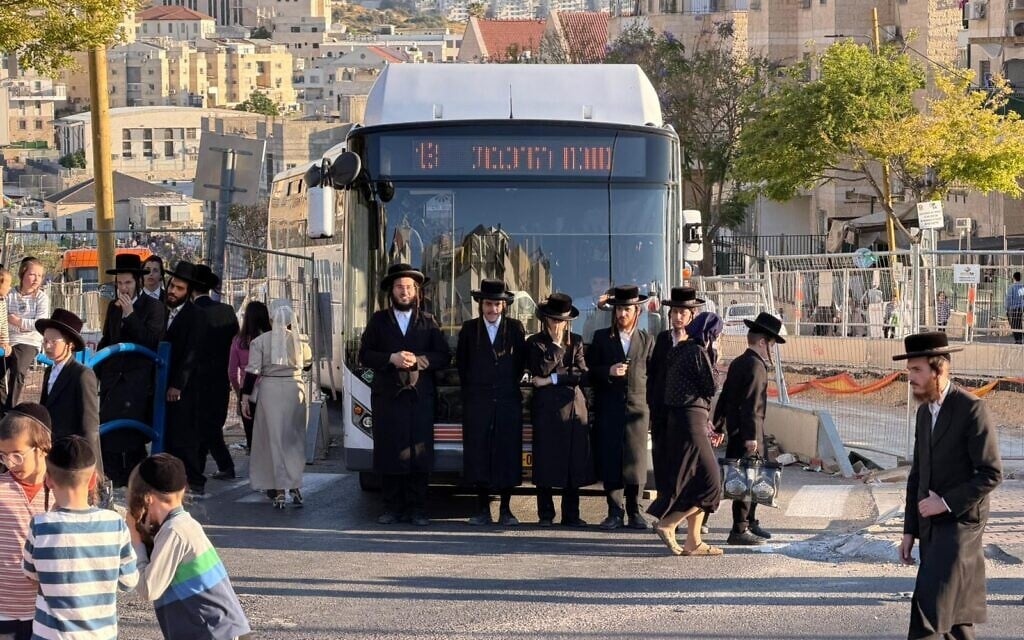 Haredi protesters attempt to block traffic on a road in Beit Shemesh during a demonstration on June 9, 2026. (Israel Police)