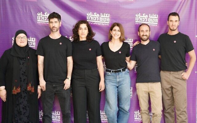 Candidates for Makom Lekulanu, the new Arab-Jewish party stemming from the Standing Together movement, announced on June 16, 2026. Chair Rula Daood is third from left. (Inas Osrof Abu Seif/Makom Lekukanu)
