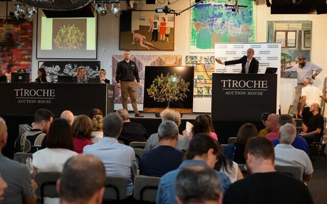 Amitai Hazan, CEO of auction house Tiroche, at the 2025 auction of Israeli artworks (Courtesy)