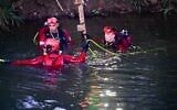 Fire and Rescue Service personnel search the area where two girls went missing, with one later found dead, at the Jordan River in northern Israel, June 27, 2026, (Fire and Rescue Service)