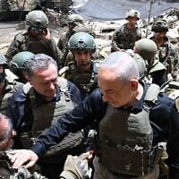 This handout photo shows Prime Minister Benjamin Netanyahu greeting IDF troops in southern Lebanon, June 30, 2026. (Haim Zach/GPO)