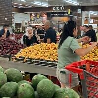 Shoppers in Souq Faisal in the town of Mazra'a, on the edge of Nahariya, on June 8, 2026. (Diana Bletter/Times of Israel)