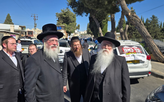 MK Meir Porush and Deputy Minister Yisrael Eichler prepare to set off on one of several anti-conscription convoys to the Neve Tzedek (Beit Lid) military prison in Kfar Yona, June 24, 2026. (Courtesy Agudat Yisrael) MK Meir Porush and Deputy Minister Yisrael Eichler prepare to set off on one of several anti-conscription convoys to the Neve Tzedek (Beit Lid) military prison in Kfar Yona, June 24, 2026. (Courtesy Agudat Yisrael)