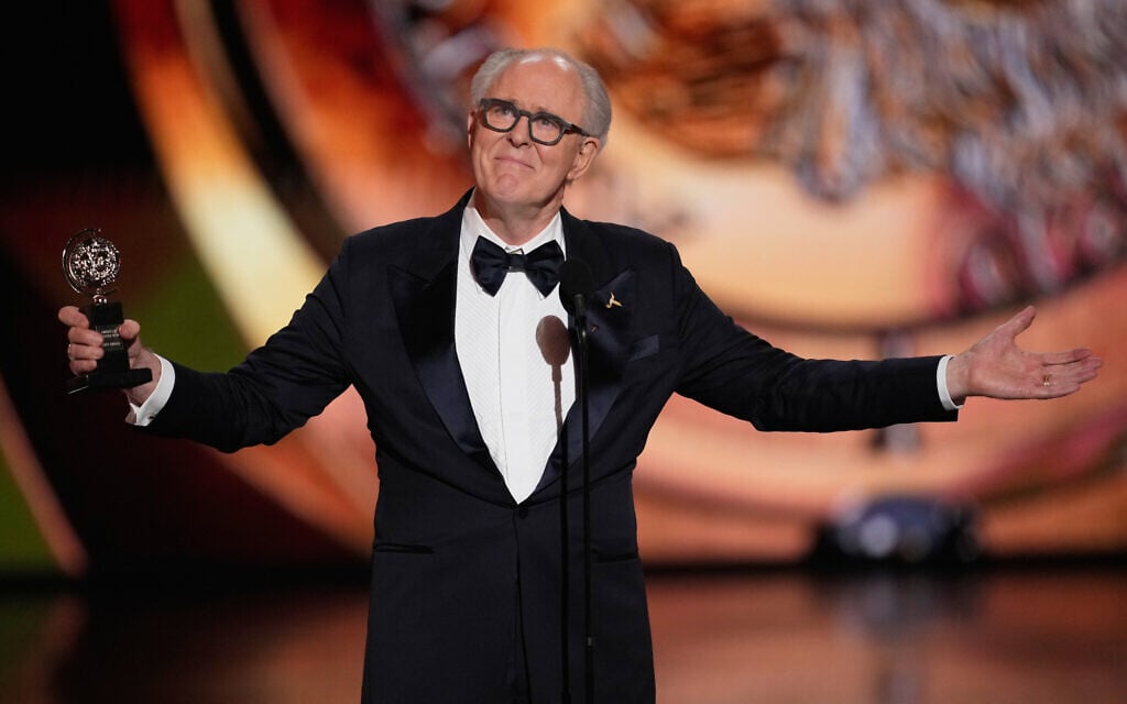 John Lithgow accepts the award for best performance by a leading actor in a play for "Giant" during the 79th Tony Awards, June 7, 2026, at Radio City Music Hall in New York. (Charles Sykes/Invision/AP)