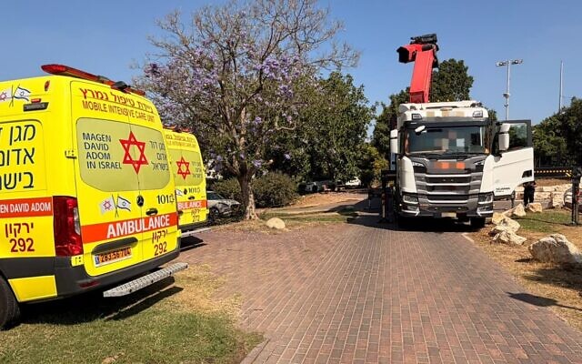 Paramedics at a scene where a worker was killed after he was hit by a heavy object, in the northern West Bank, June 11, 2026. (MDA)