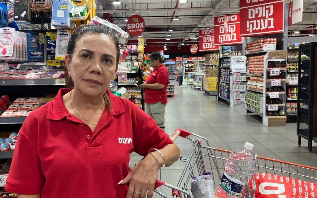 Shosh Rachamin, the shift manager at the Universe Supermarket in Nahariya on June 8, 2026. (Diana Bletter/Times of Israel)