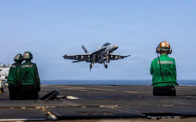 An F/A-18E Super Hornet, attached to Strike Fighter Squadron (VFA) 14, preparing to make an arrested landing on the flight deck of Nimitz-class aircraft carrier USS Abraham Lincoln on May 25, 2026. (AFP PHOTO / US NAVY / NAVCENT PUBLIC AFFAIRS) An F/A-18E Super Hornet, attached to Strike Fighter Squadron (VFA) 14, preparing to make an arrested landing on the flight deck of Nimitz-class aircraft carrier USS Abraham Lincoln on May 25, 2026. (AFP PHOTO / US NAVY / NAVCENT PUBLIC AFFAIRS)
