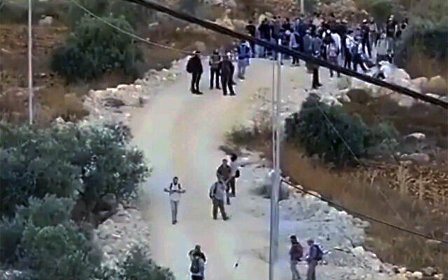 Settler activists take part in an unauthorized 'hike' near the West Bank village of Tell, July 31, 2026. (Screenshot/X used in accordance with clause 27a of the copyright law)