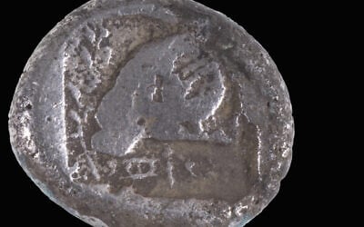 The 2,500-year-old coin from Cyprus discovered in Ashdod (Shai Halevi/Israel Antiquities Authority)