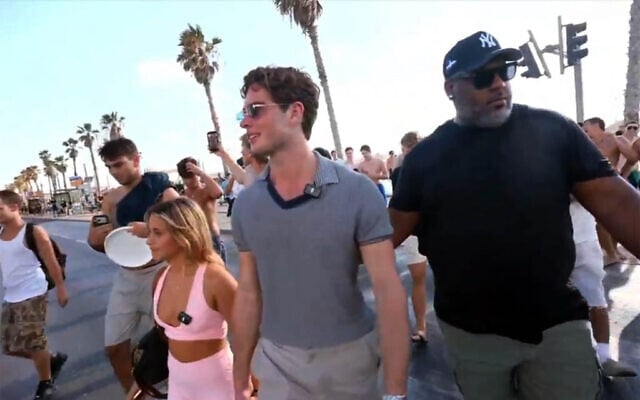Controversial 'looksmaxxing' influencer Clavicular is seen on the beach in Tel Aviv in July 2026. (Screenshot/Kick)