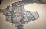 A mosaic found in Huqoq depicts Samson carrying the gates of Gaza on his shoulders (Einat Ambar-Armon/IAA)