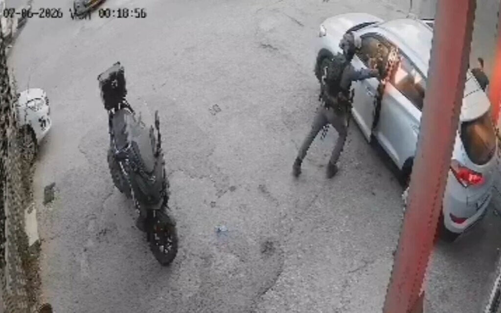 Screengrab of a CCTV video showing a Border Police officer throwing a stun grenade into a car full of passengers and forcing the door shut as it explodes, July 5, 2026. (X, used in accordance with Clause 27a of the Copyright Law)