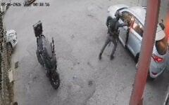 Screengrab of a CCTV video showing a Border Police officer throwing a stun grenade into a car full of passengers and forcing the door shut as it explodes, July 5, 2026. (X, used in accordance with Clause 27a of the Copyright Law)