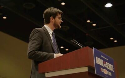 William Lawrence, Democratic candidate for US Congress in Michigan, speaks at a rally headlined by US Senate candidate Abdul El-Sayed and US Senator Bernie Sanders, July 19, 2026, Lansing, Michigan. (Screenshot via YouTube/ via JTA) William Lawrence, Democratic candidate for US Congress in Michigan, speaks at a rally headlined by US Senate candidate Abdul El-Sayed and US Senator Bernie Sanders, July 19, 2026, Lansing, Michigan. (Screenshot via YouTube/ via JTA)