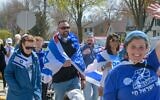 Milwaukee Jews march in the community's annual Walk for Israel, part of the federation's celebrations for Israel's independence day. (Courtesy of the Milwaukee Jewish Federation via JTA)