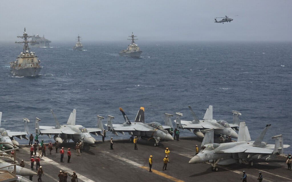 US Navy warships and aircraft transit the Arabian Sea in close formation, in a photo released July 8, 2026. (US Navy photo) US Navy warships and aircraft transit the Arabian Sea in close formation, in a photo released July 8, 2026. (US Navy photo)