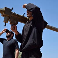Illustrative: Rebel-fighters monitor the sky holding a FN-6 man-portable air-defence system (MANPADS) in the Syrian village of Teir Maalah, on the northern outskirts of Homs, on April 20, 2016. (MAHMOUD TAHA/AFP)