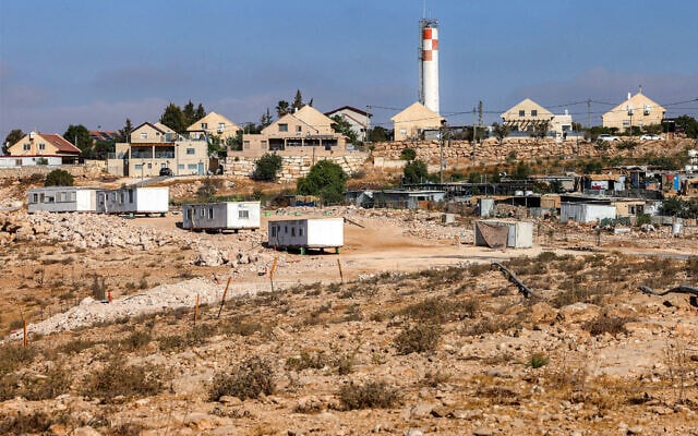 Newly-erected mobile houses set up by Israeli settlers are pictured near the Palestinian village of Umm al-Kheir in the Masafer Yatta area, south of Hebron in the West Bank, on August 28, 2025. (Hazem Bader/AFP)