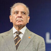Pakistan's Prime Minister Shehbaz Sharif reacts before a quadrilateral meeting between the United States, Iran, Pakistan and Qatar at the Burgenstock luxury hotel complex overlooking Lake Lucerne, Switzerland, on June 21, 2026. (URS FLUEELER / POOL / AFP)
